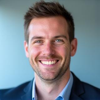 Professional headshot of Ben Carter.